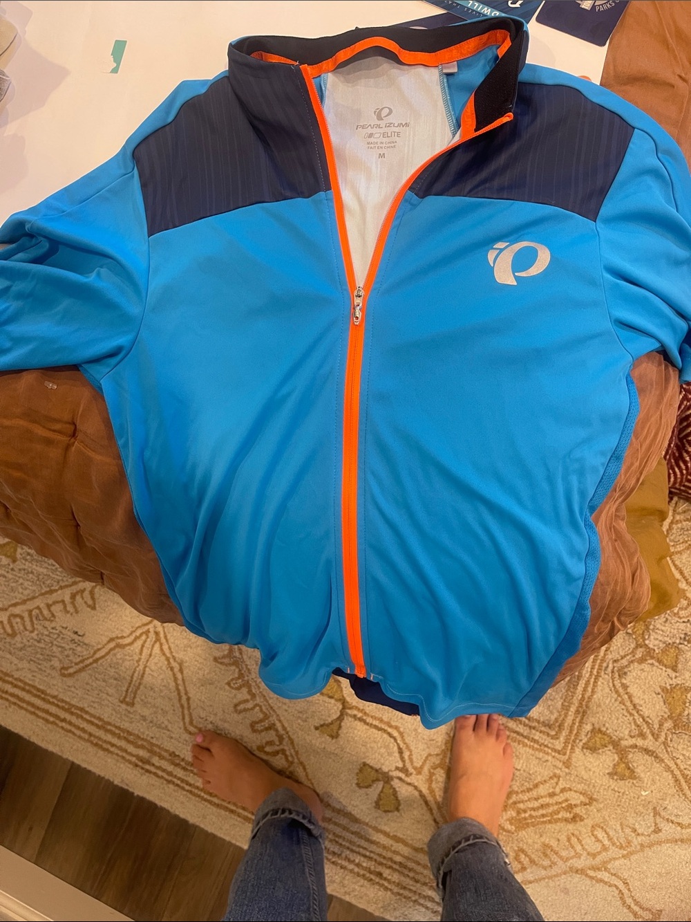 Pearl Izumi Men’s Bright Blue Cycling Jacket with Orange Zipper and Navy Yoke